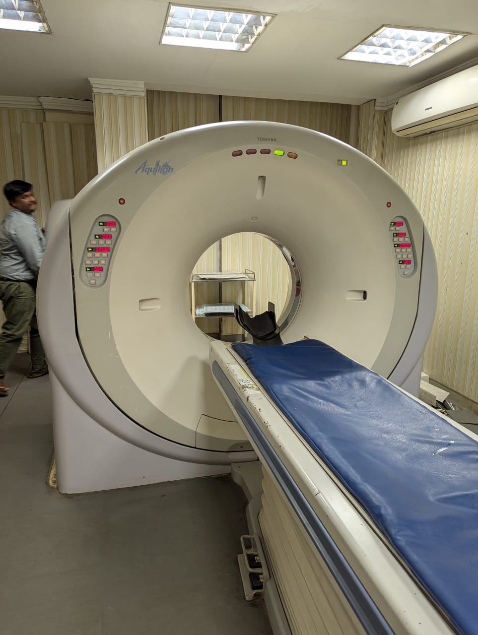 Owner servicing MRI equipment